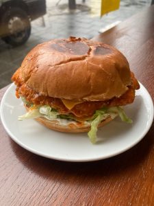 Crispy fried chicken burger at Vibe Coffee