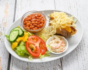 Jacket potato with beans and salad at Vibe Coffee